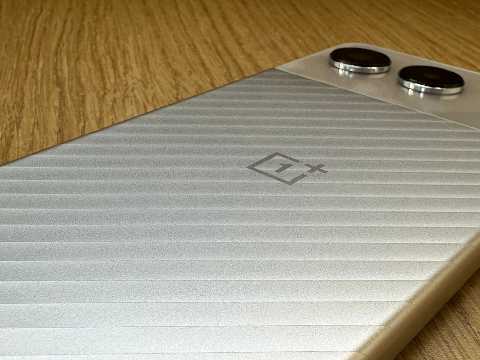 The signature OnePlus alert slider, a fan-favorite feature, is present on the left edge